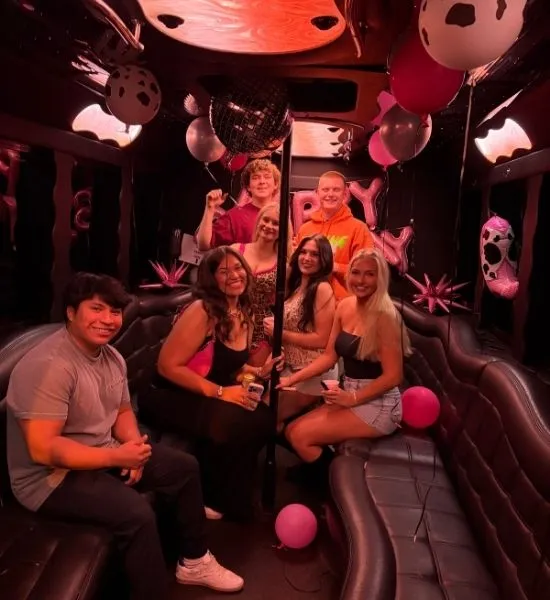 celebrating birthday party with friends on a party bus in tallahassee